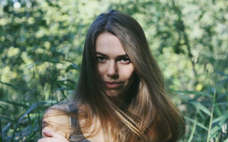 brown haired woman staring at the camera